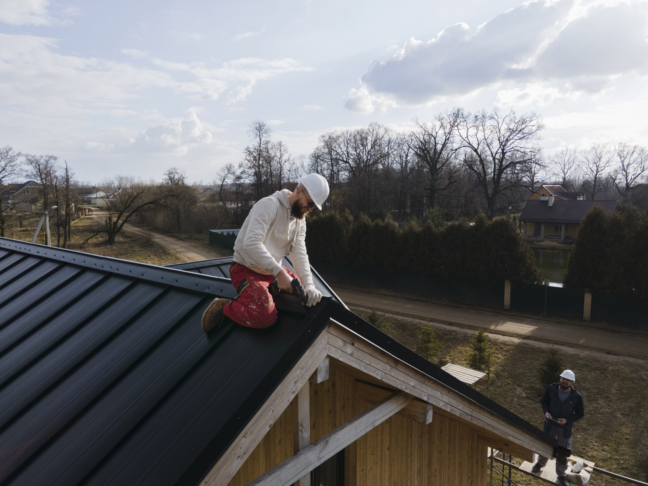 full-shot-roofer-working-with-helmet